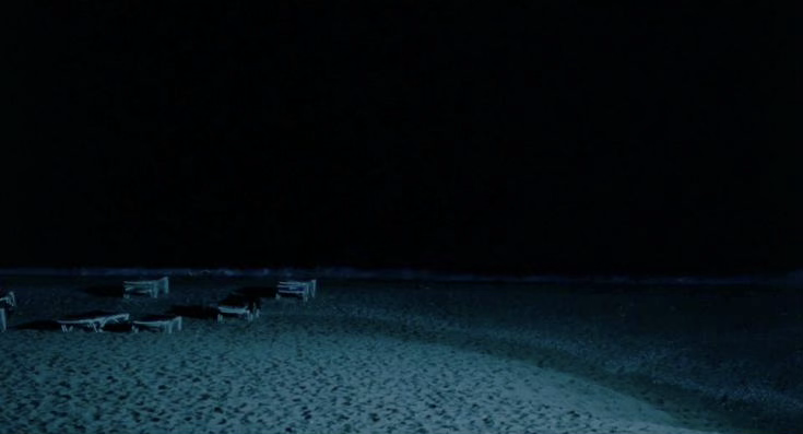 a beach in the darkness